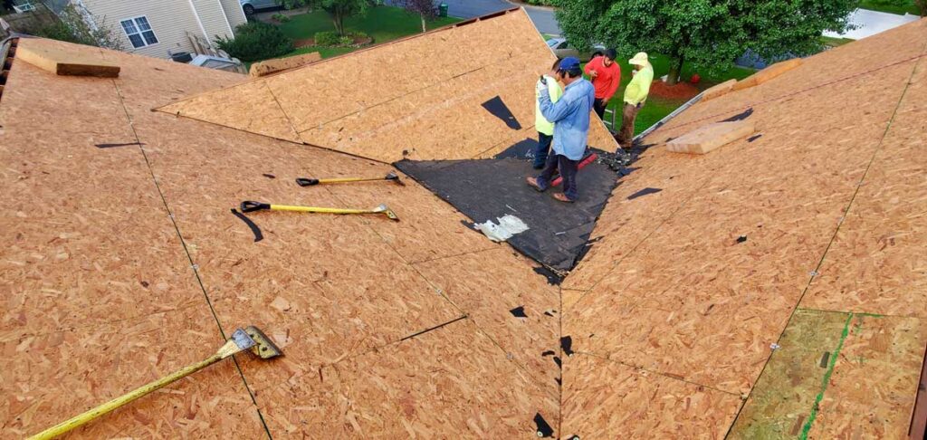 Man Providing Roof Replacement Services