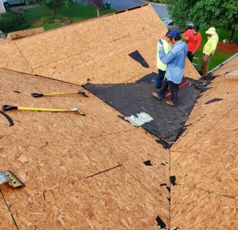 Man Providing Roof Replacement Services