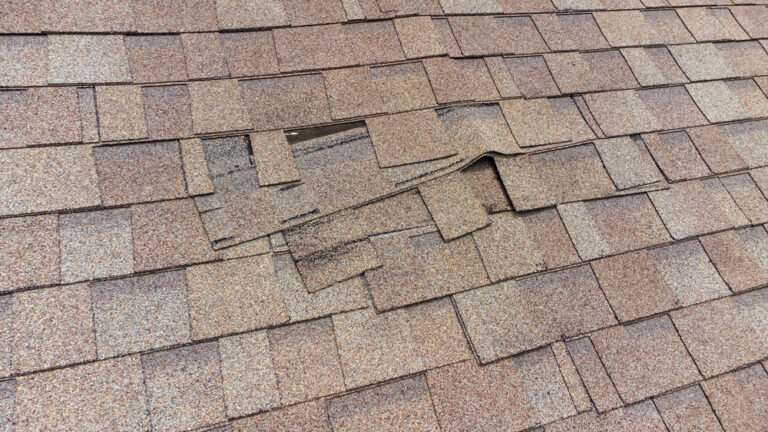 how storm damage affects roof warranty