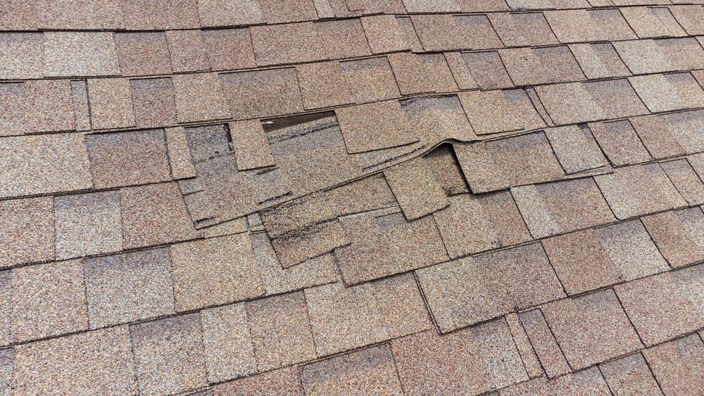 how storm damage affects roof warranty